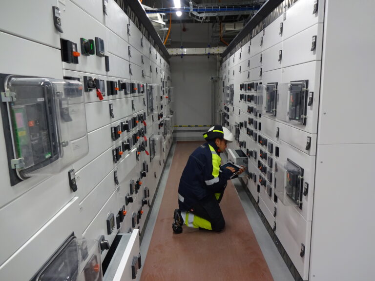 Engineer wearing PPE makes Electrical safety audit