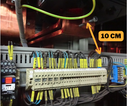 Arc Flash & Shock Hazard 3 Photo 2. The distance from the terminal rail to the live copper busbars is barely ~10 cm. There is no physical barrier between them.